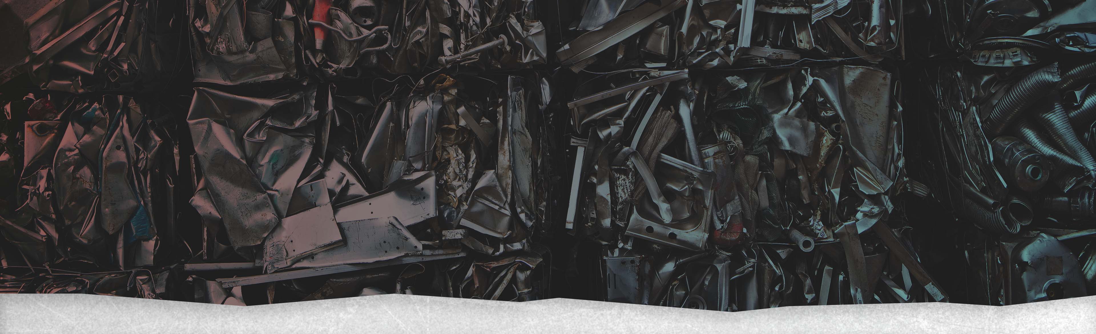 Maumee Metal Recycling Bales of crushed metal.